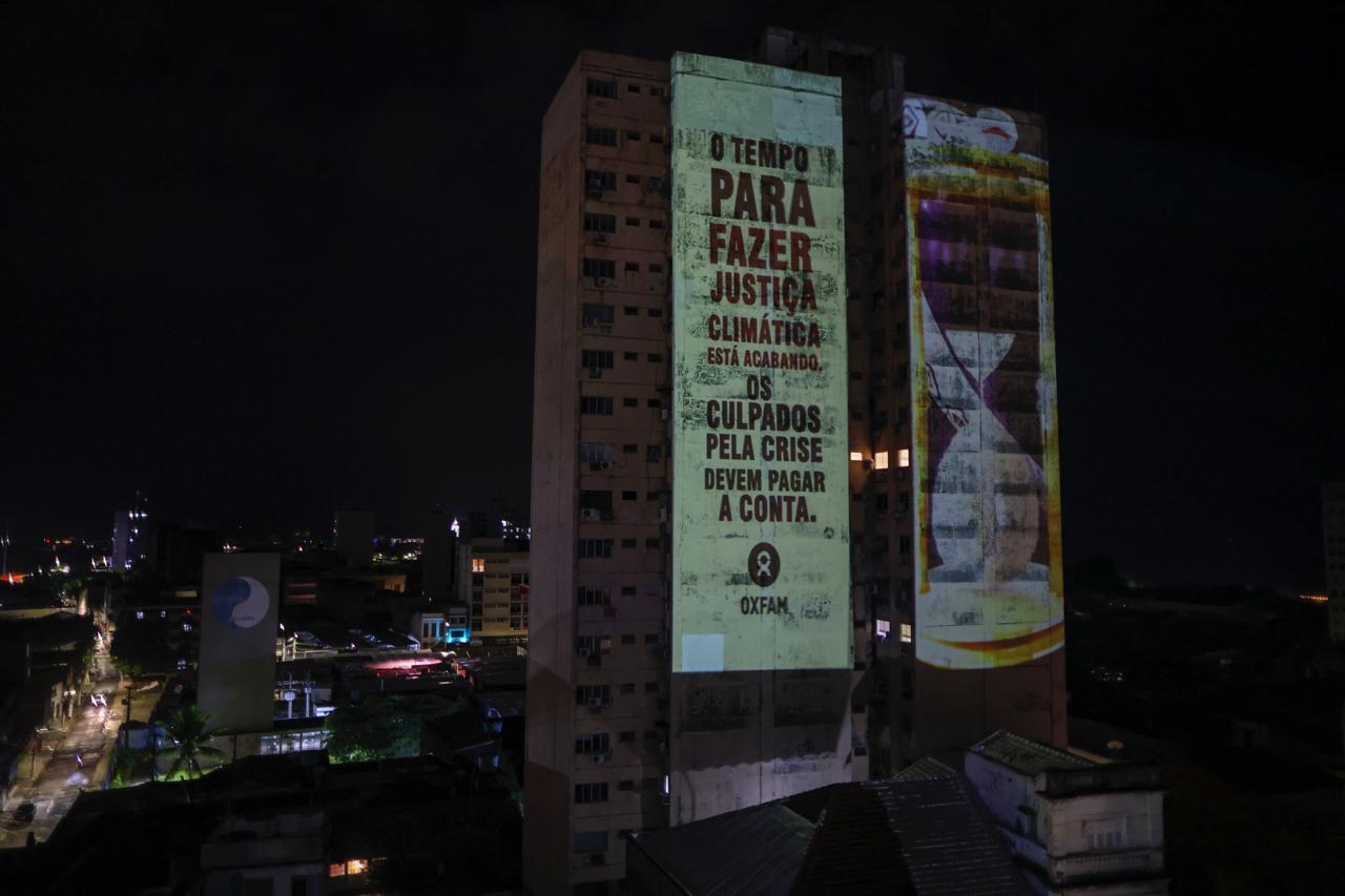 Proje&ccedil;&otilde;es de protesto em pr&eacute;dios do centro de Bel&eacute;m pedem justi&ccedil;a clim&aacute;tica e puni&ccedil;&atilde;o aos respons&aacute;veis pelo danos ambientais